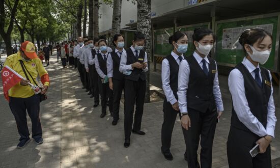 Chinese State-Run Firm Mandates Some Employees Take Part in COVID-19 Vaccine Trials: Leaked Document