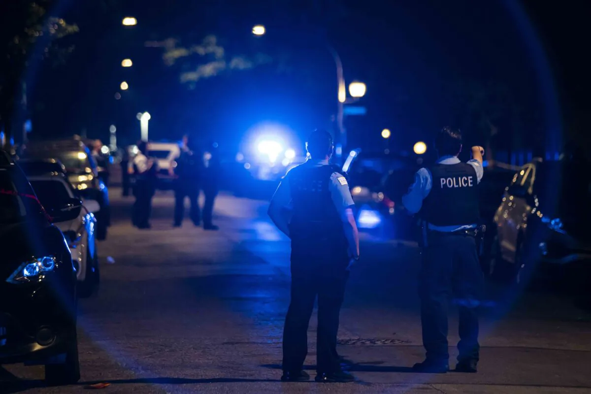 Police investigate in the 7200 block of South Artesian in Marquette Park, Chicago, Ill., on July 3, 2020. (Ashlee Rezin Garcia/Sun-Times)