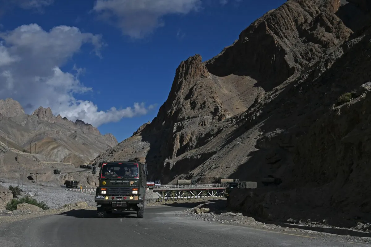 A military convoy drives towards Leh along the Srinagar-Leh Highway on June 29, 2020. (Tauseef Mustafa/AFP via Getty Images)
