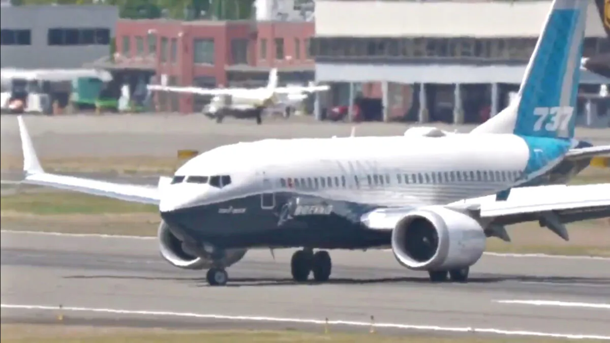 This screenshot from a video shows a Boeing 737-7 Max aircraft lands after completing a flight testing to be re-certified, at north side of Boeing Field in Seattle, Wash., on June 29, 2020. ( The Museum Of Flight/ Reuters)