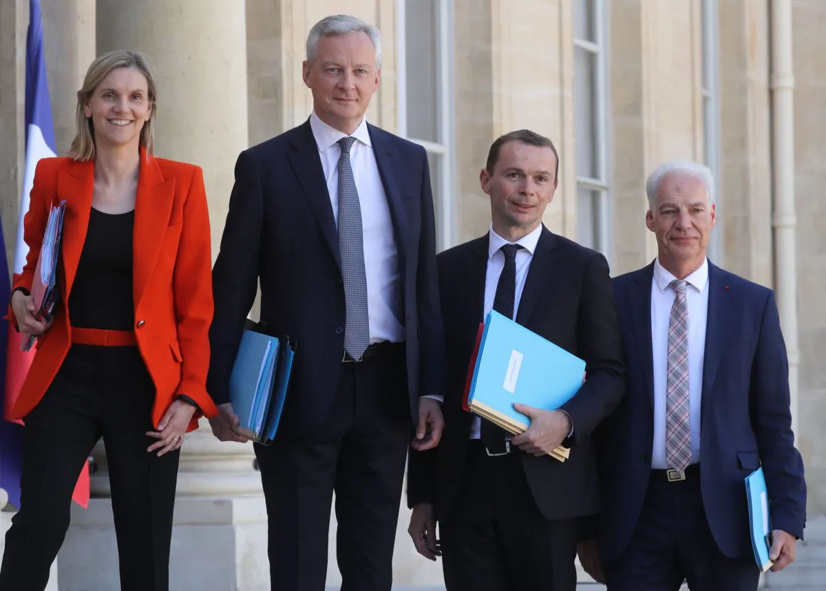 French Junior Industry Minister Agnes Pannier-Runacher, le French Economy and Finance Minister Bruno Le Maire, French Junior Minister of Public Action and Accounts Olivier Dussopt, and French Junior Minister of Small and Medium Entreprises Alain Griset arrive to attend the first weekly cabinet meeting after the government reshuffle, at the Elysee Palace in Paris, France, on July 7, 2020. (Ludovic Marin/AFP via Getty Images)