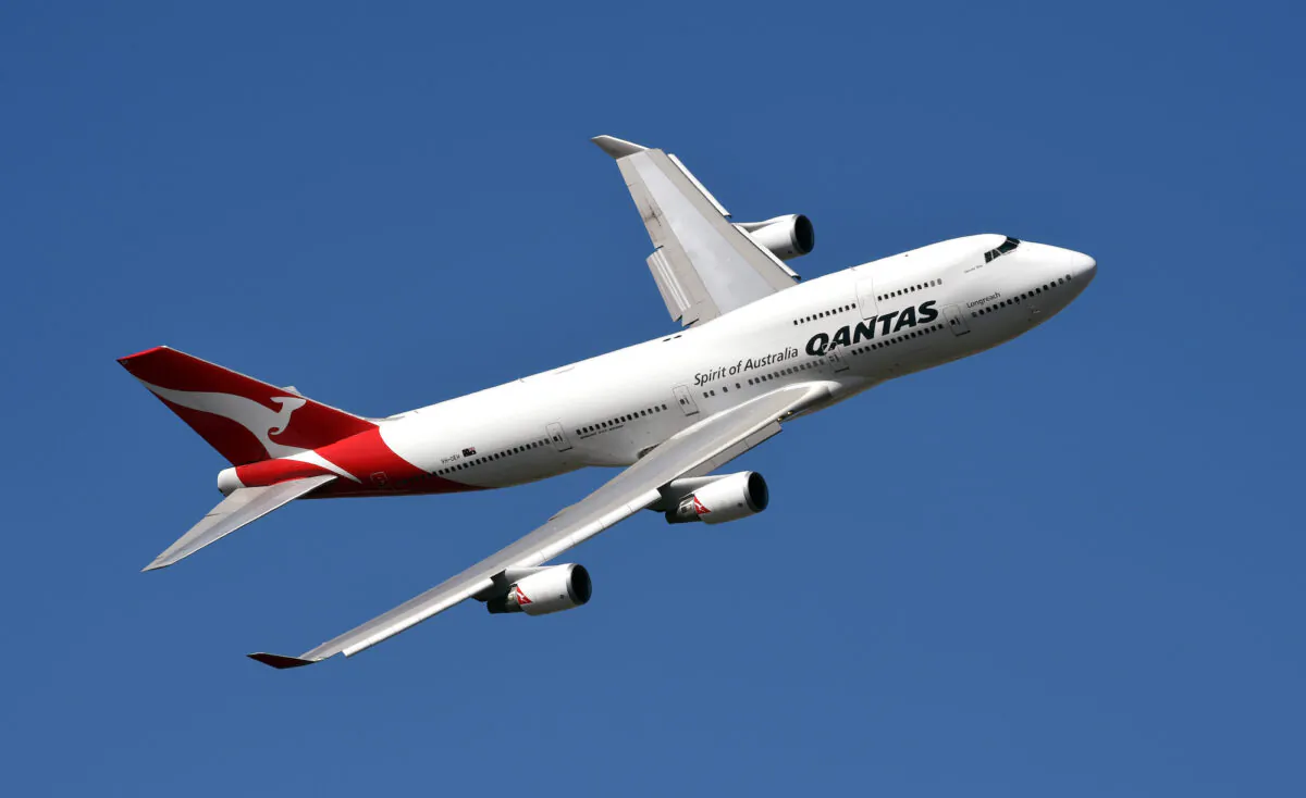A Qantas Boeing 747 during a fly past at the Formula One Australian Grand Prix in Melbourne on March 15, 2015. (William West/AFP via Getty Images)