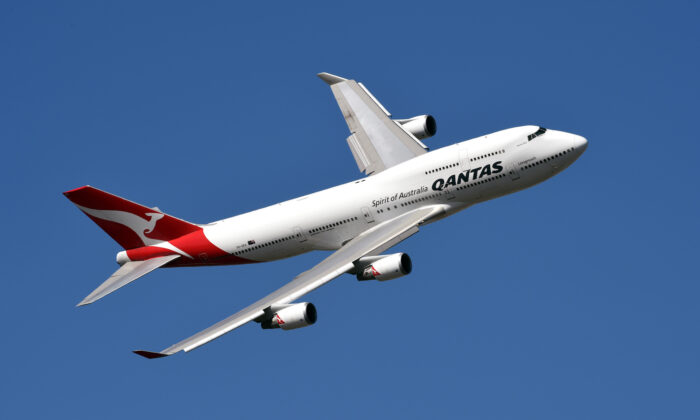 A Qantas Boeing 747 during a fly past at the Formula One Australian Grand Prix in Melbourne on March 15, 2015. (William West/AFP via Getty Images)