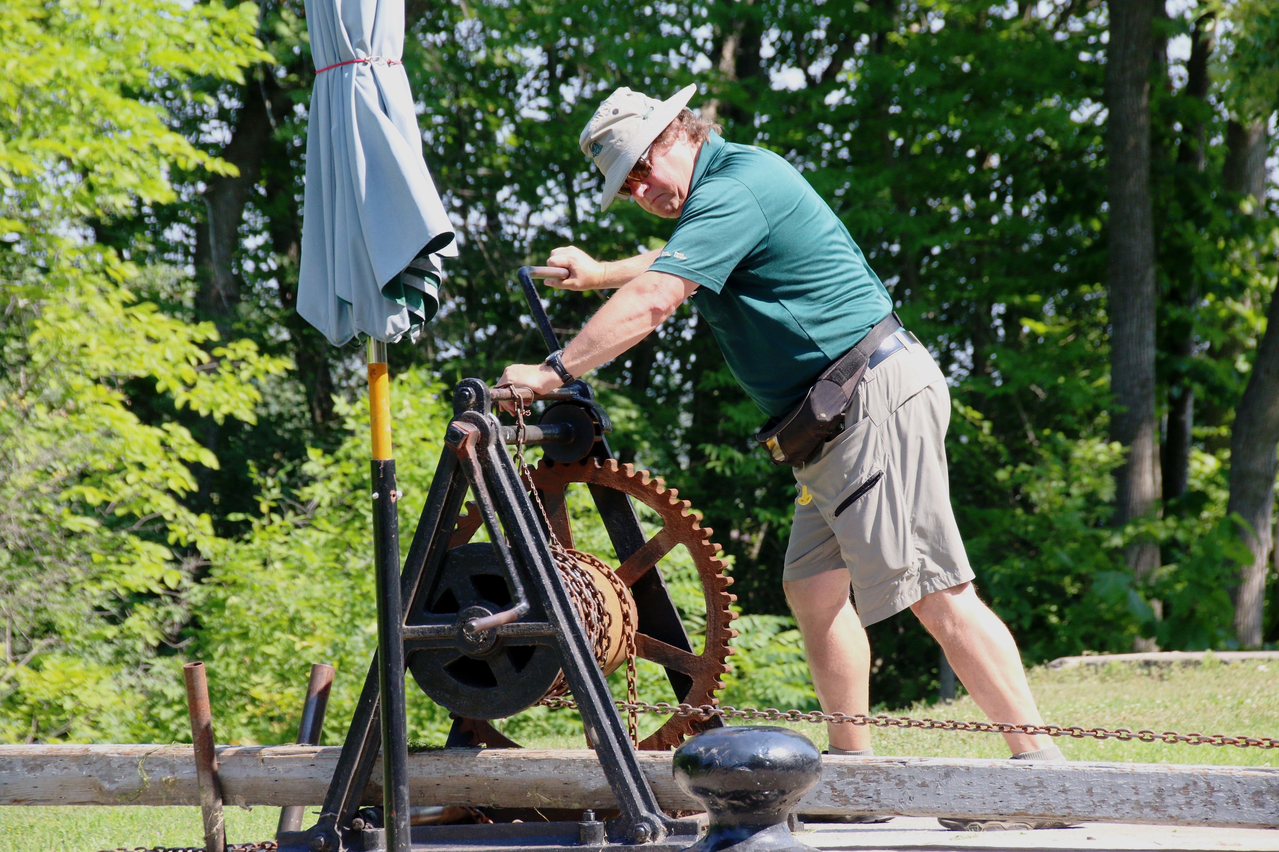 A Parks Canada worker operates the locks.