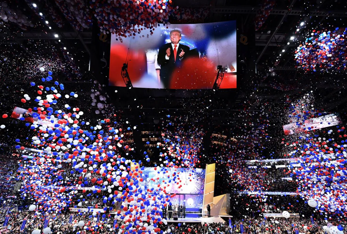 Republican presidential candidate Donald Trump is seen onscreen at the closing of the Republican National Convention at the Quicken Loans Arena in Cleveland, Ohio on July 21, 2016. (Jim Watson/AFP/Getty Images)