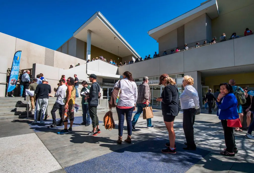 People wait to vote during the presidential primary at the Santa Monica Public Library in Santa Monica, Calif., on March 3, 2020. (Mark Ralston/AFP via Getty Images)