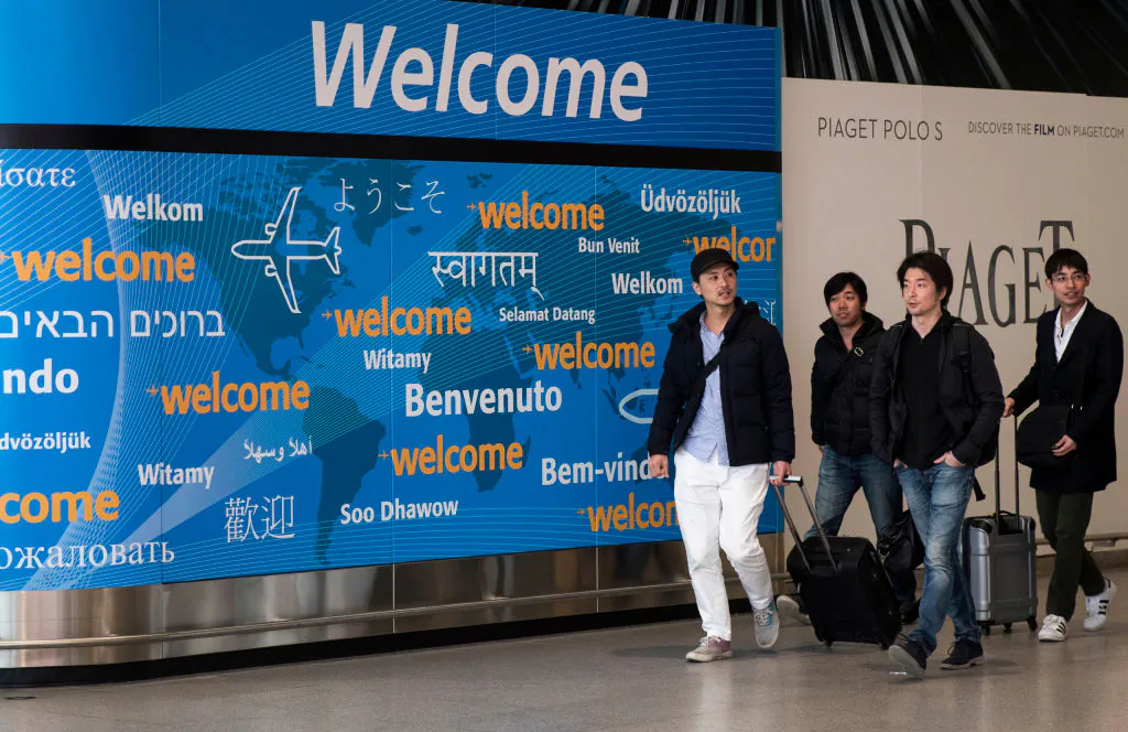 Travelers arrive at the international terminal at John F. Kennedy International Airport, in New York City, on March 6, 2017. (Drew Angerer/Getty Images)