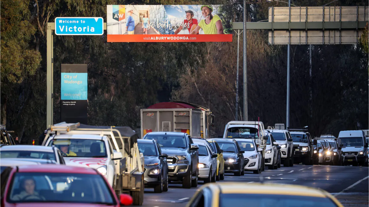 Cars queue at the Victorian border near a police checkpoint in Albury, Australia on July 8, 2020. (David Gray/Getty Images)
