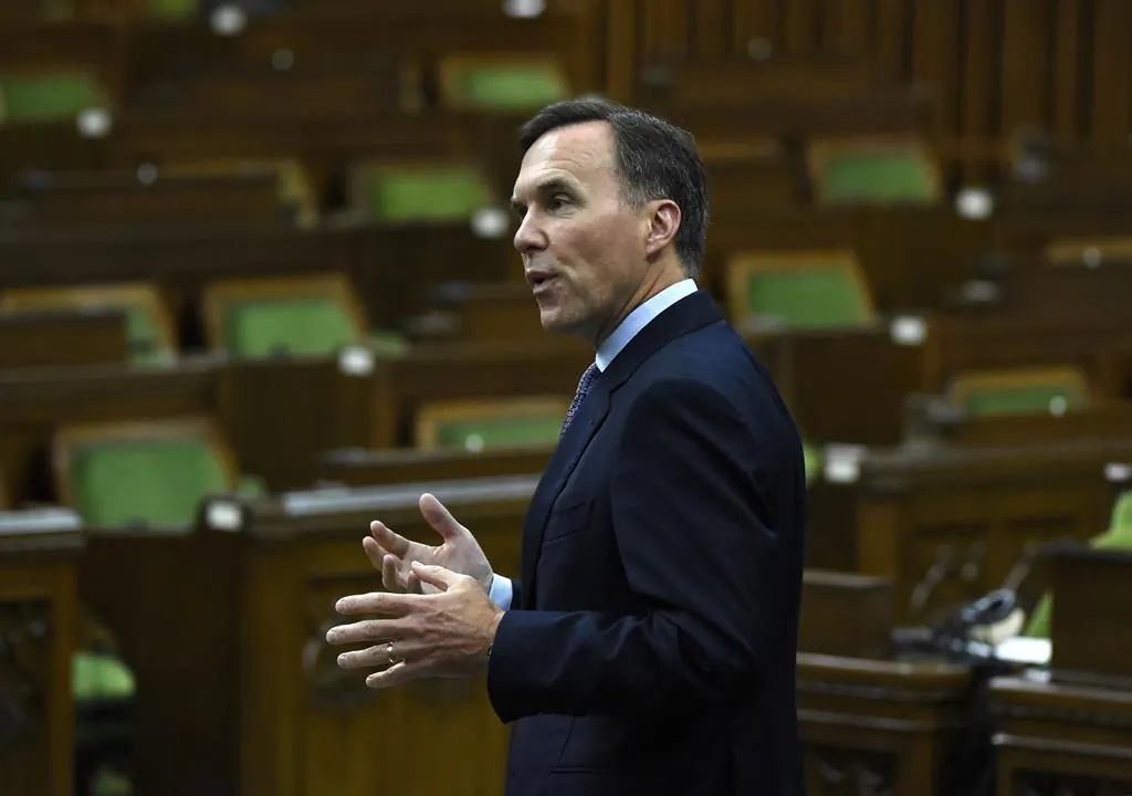 Finance Minister Bill Morneau rises during a meeting of the Special Committee on the COVID-19 pandemic in the House of Commons on Parliament Hill in Ottawa, on June 17, 2020. (Justin Tang/The Canadian Press)
