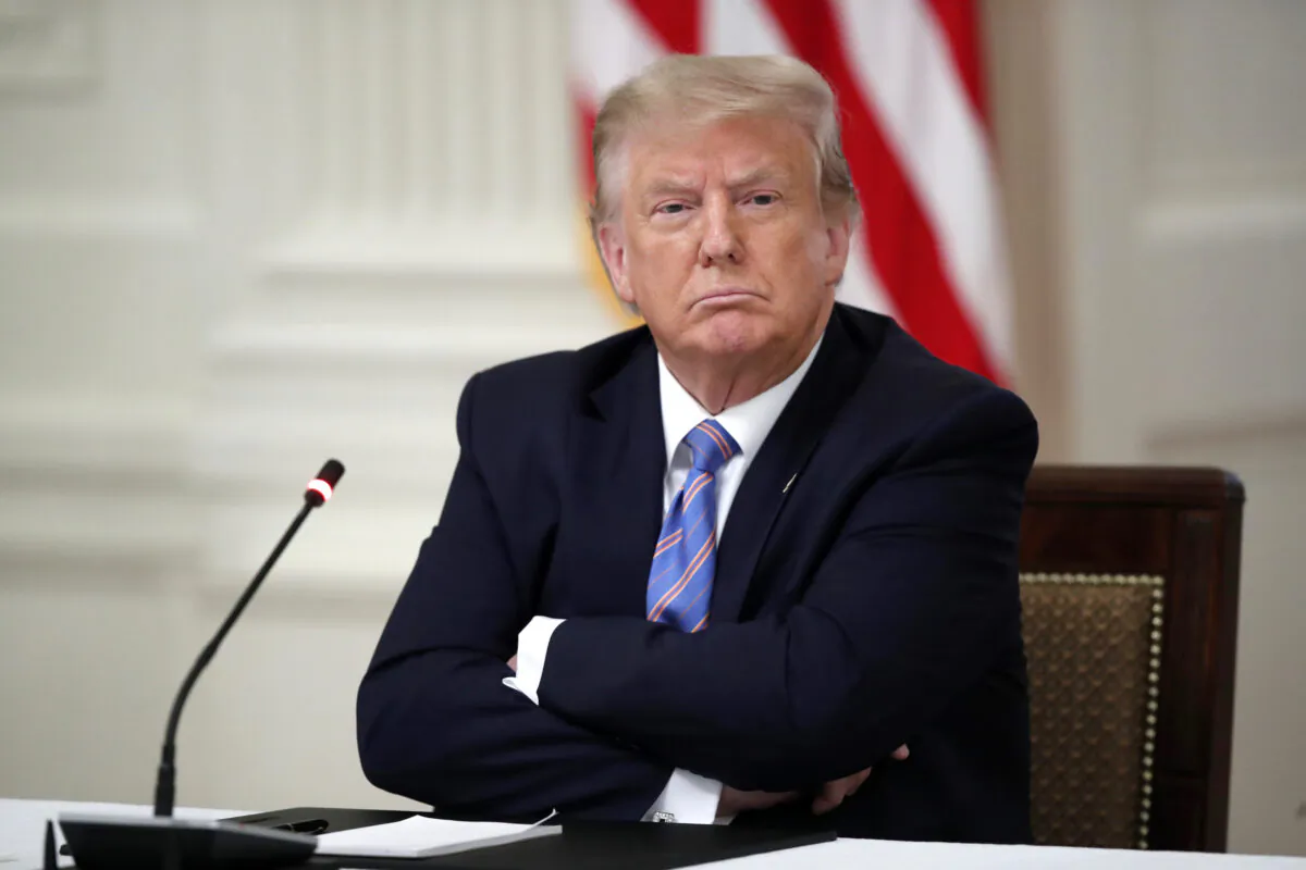 President Donald Trump listens during a "National Dialogue on Safely Reopening America's Schools," event in the East Room of the White House, in Washington on July 7, 2020. (Alex Brandon/AP Photo)