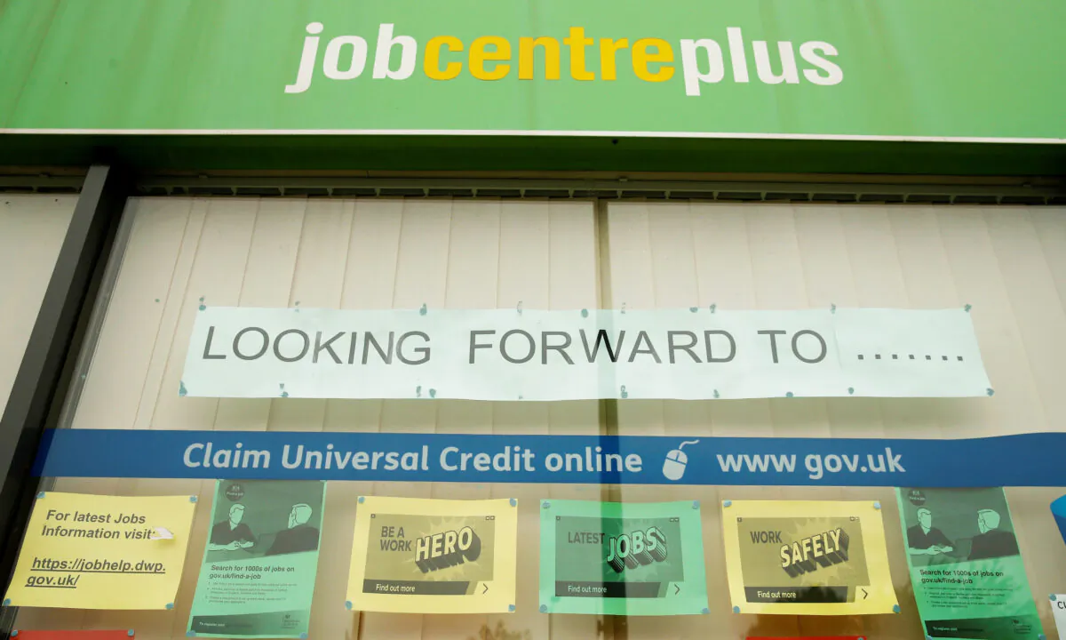 Job adverts are seen in the window of a job centre following the outbreak of the coronavirus disease (COVID-19), in Manchester, Britain, on July 8, 2020. (Phil Noble/Reuters)