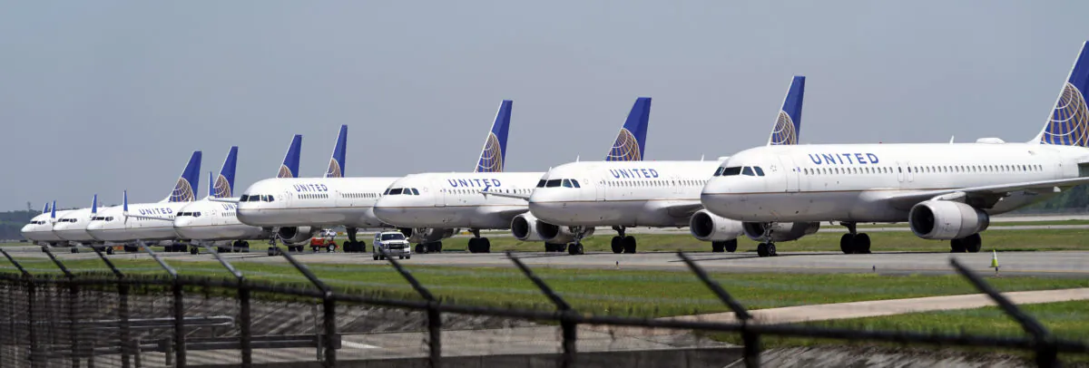 United Airlines planes are parked at George Bush Intercontinental Airport in Houston, Texas, on March 25, 2020. (David J. Phillip/AP)