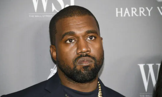 Kanye West Escorted from Skechers Headquarters in Manhattan Beach