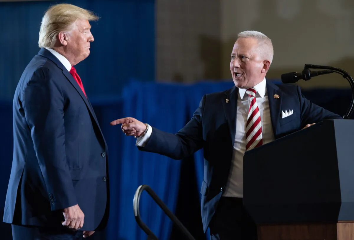 Rep. Jeff Van Drew (R-N.J.), who recently switched parties, gestures toward President Donald Trump during a "Keep America Great" campaign rally at Wildwoods Convention Center in Wildwood, N.J., on Jan. 28, 2020. (Saul Loeb/AFP via Getty Images)