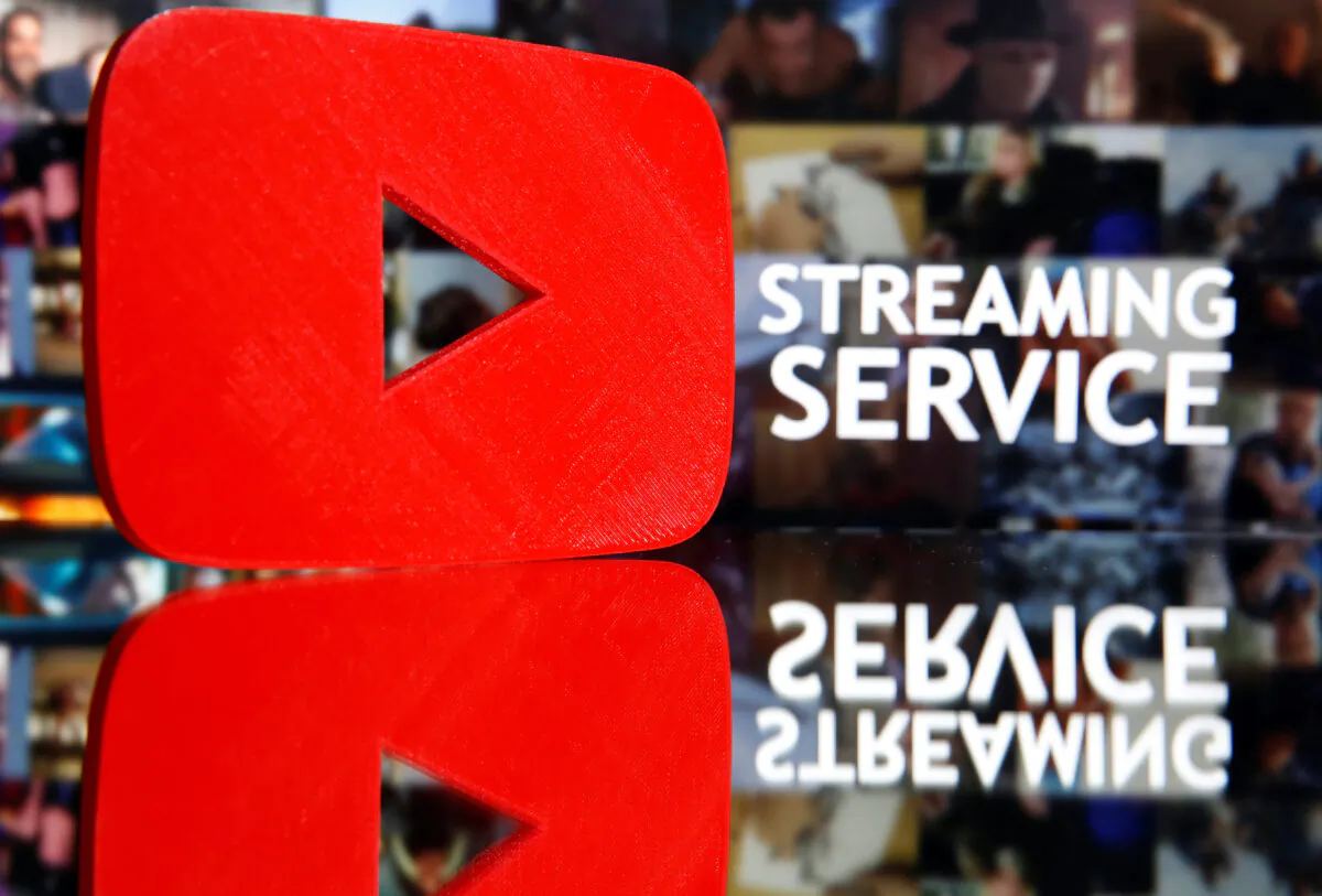 A 3D-printed YouTube logo is seen in front of displayed "Streaming service" words in this illustration taken March 24, 2020. (Dado Ruvic/Reuters)