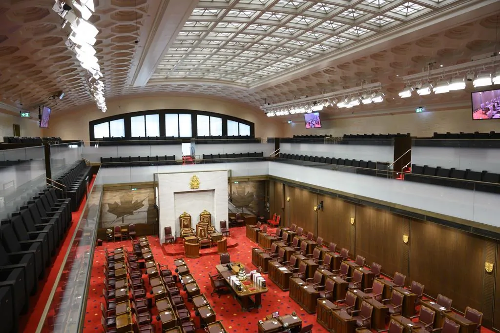 The Senate of Canada building and Senate Chamber are pictured in Ottawa on Feb. 18, 2019. (The Canadian Press/Sean Kilpatrick)