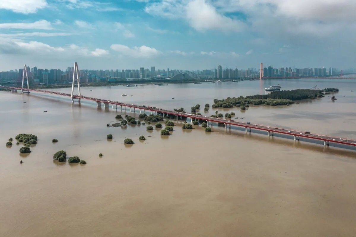 Streets inundated by floodwaters from the swollen Yangtze River in Wuhan, China, on July 8, 2020. (STR/AFP via Getty Images)