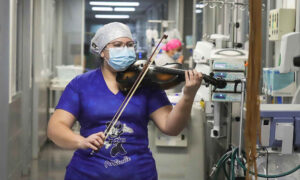 Chilean Nurse Serenades COVID-19 Patients With Violin to Give Them 'Love' and 'Hope'
