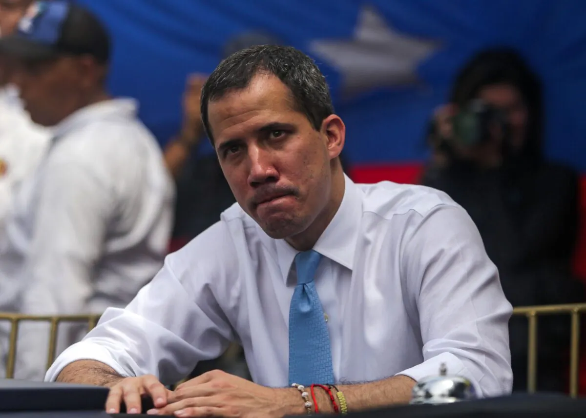 Venezuelan opposition leader Juan Guaido gestures during a rally in the framework of a demonstration heading to the National Assembly, at Las Mercedes district, in eastern Caracas, on March 10, 2020. (Cristian Hernandez/AFP via Getty Images)