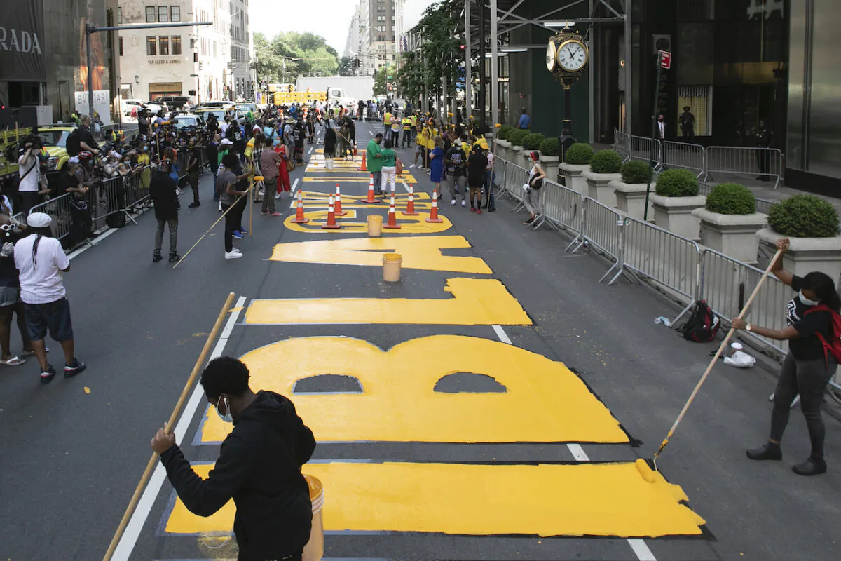 Black Lives Matter is painted on Fifth Avenue in front of Trump Tower in Manhattan, N.Y., July 9, 2020. (Mark Lennihan/AP Photo)