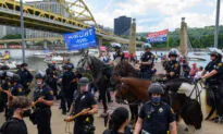 Pennsylvania Police Officer Who Kicked Seated Protester Won’t Face Criminal Charges