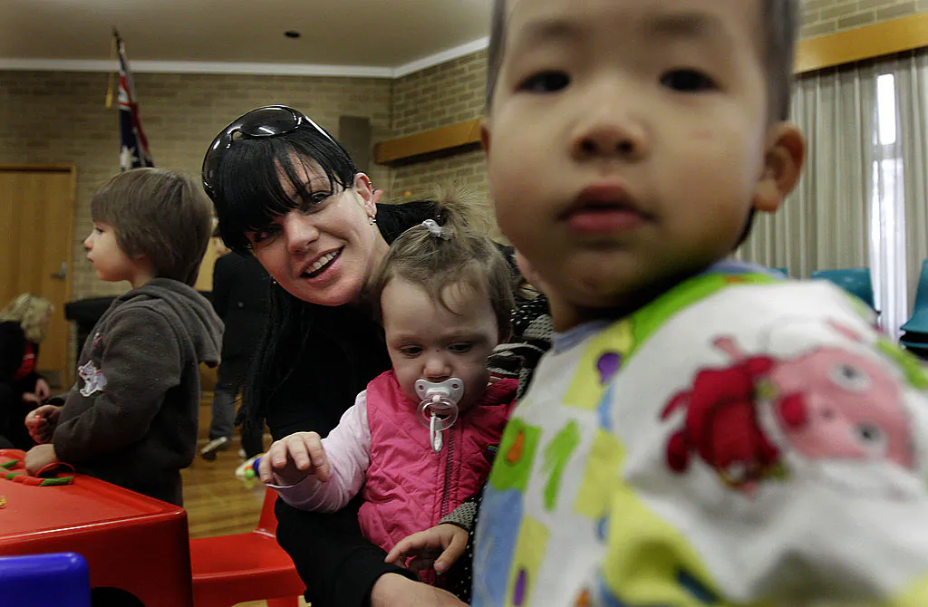 In this handout photo provided by Save The Children, American actress Pauley Perrettethe, makes a surprise visit to a Save the Children mobile kindergarten in Melbourne's northern suburbs on June 4, 2010 in Melbourne, Australia. (Luis Ascui/ Getty Images)