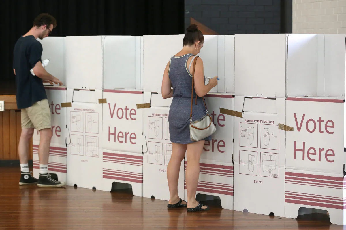 Voters are seen keeping a distance at Brisbane City Hall in Brisbane, Australia on March 28, 2020. (Jono Searle/Getty Images)