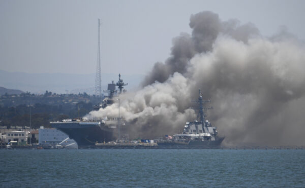 Smoke rises from the USS Bonhomme Richard