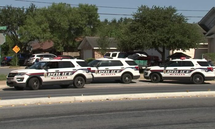 Police cars at the scene of a shooting that left two officers dead after they reportedly responded to a disturbance call, in McAllen, Texas, on July 11, 2020. (Courtesy of KRGV)