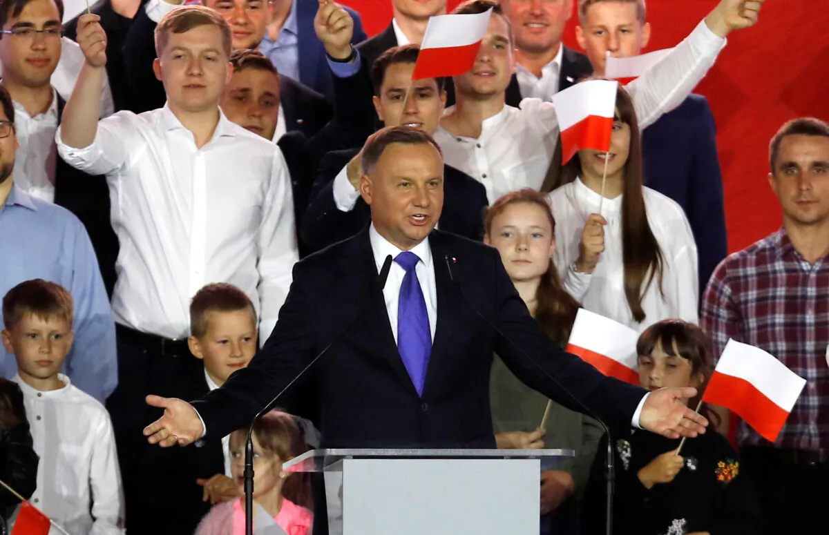 Polish President and presidential candidate of the Law and Justice (PiS) party Andrzej Duda speaks after the announcement of the first exit poll results on the second round of the presidential election in Pultusk, Poland, on July 12, 2020. (Kacper Pempel/Reuters)