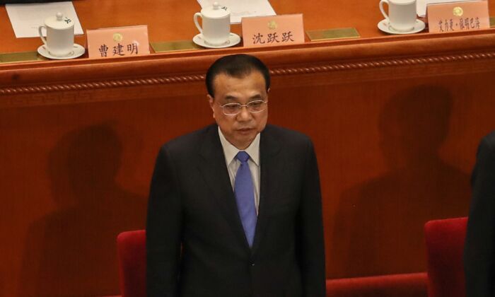 Chinese Premier Li Keqiang is in the closing session of the Chinese rubber stamp legislature conference in Beijing, China, on May 27, 2020. (Andrea Verdelli/Getty Images)