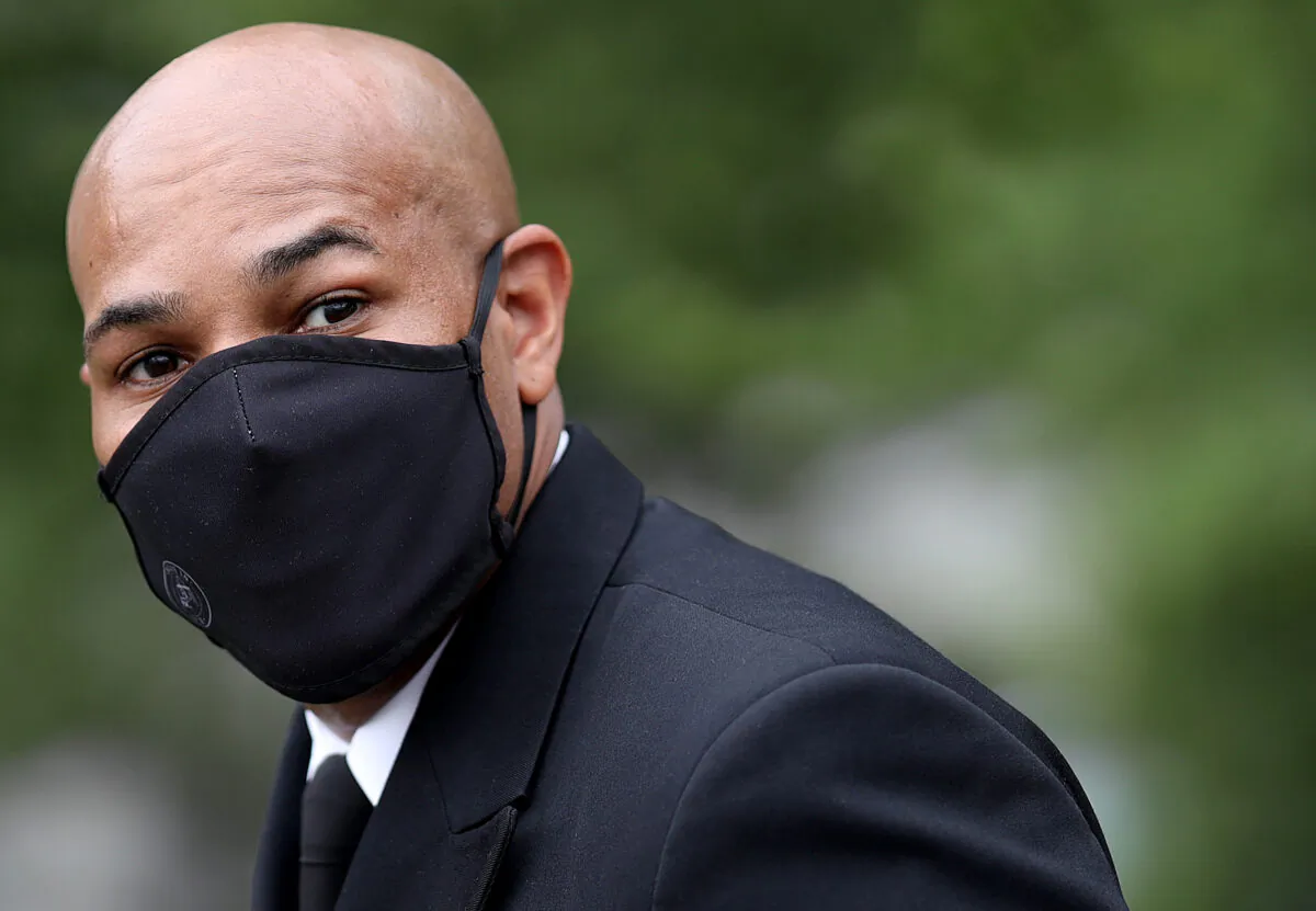 Surgeon General Jerome Adams walks to the West Wing of the White House after a television interview in Washington on July 7, 2020. (Win McNamee/Getty Images)