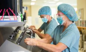 Amid Surge, Hospitals Hesitate to Cancel Nonemergency Surgeries