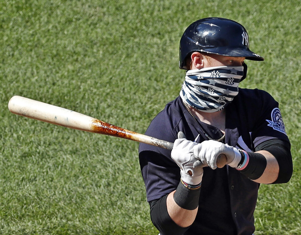 New York Yankees’ Clint Frazier wears a face covering while batting during an intrasquad game in baseball summer training camp at Yankee Stadium in New York City on July 12, 2020. (Kathy Willens/AP Photo)