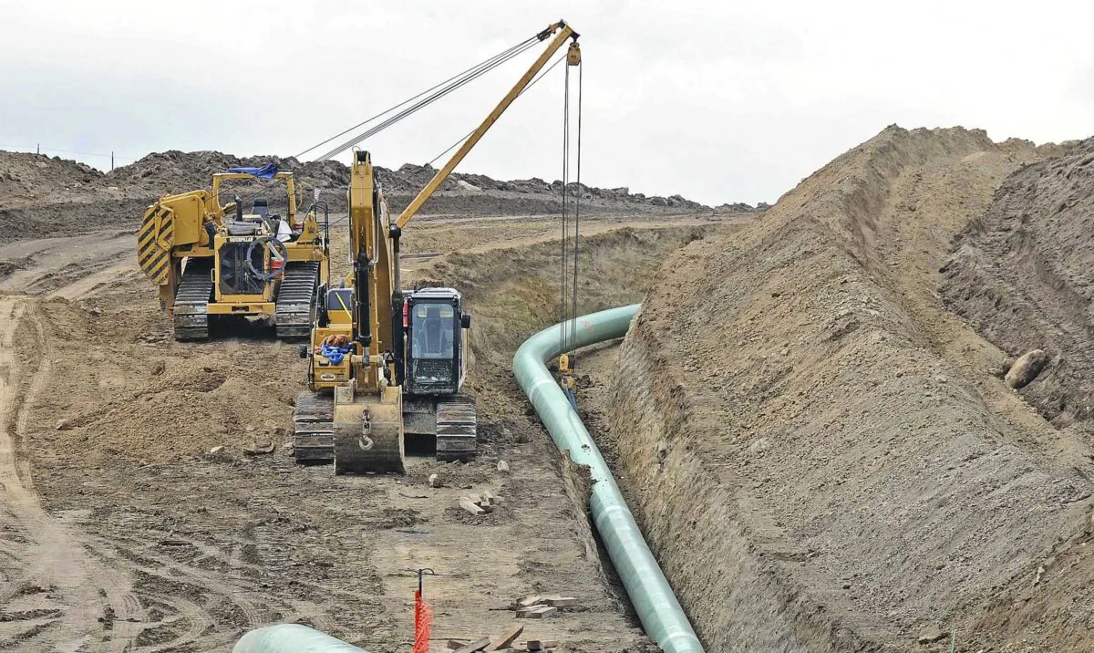 Heavy equipment is seen at a site where sections of the Dakota Access pipeline were being buried near the town of St. Anthony in Morton County, N.D., on Oct. 5, 2016. (Tom Stromme/The Bismarck Tribune via AP)