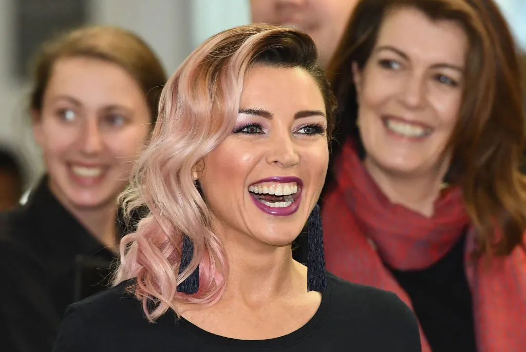 Danni Minogue has a laugh during a press conference announcing Virgin Australia's new Melbourne to Los Angeles flights on April 4, 2017 in Melbourne, Australia.  (Quinn Rooney/Getty Images)