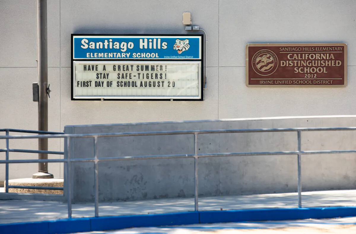 A sign at Santiago Hills Elementary School anticipates the first day of school for the 2020–21 school year in Irvine, Calif., on July 14, 2020. (John Fredricks/The Epoch Times)