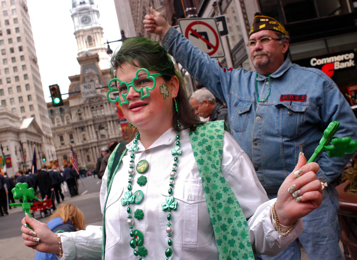 A woman watches the St. Patrick’s Day Parade in Philadelphia, Penn., on March 14, 2004. City officials announced a six-month moratorium on public events on July 14, 2020. (William Thomas Cain/Getty Images)