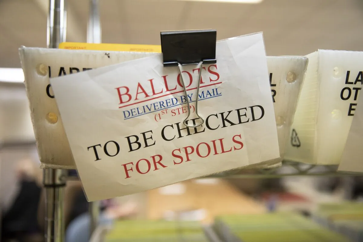 Mailed in ballots sit in U.S. Postal Service bins inside the office of the Stanislaus County Clerk in Modesto, Calif. on Nov. 6, 2018. (Alex Edelman/Getty Images)