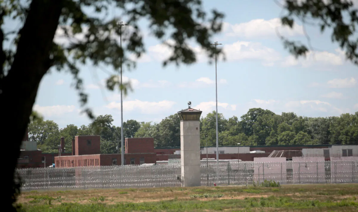 A guard tower sits along a security fence at the Federal Correctional Complex in Terre Haute, Ind., on July 13, 2020. (Scott Olson/Getty Images)