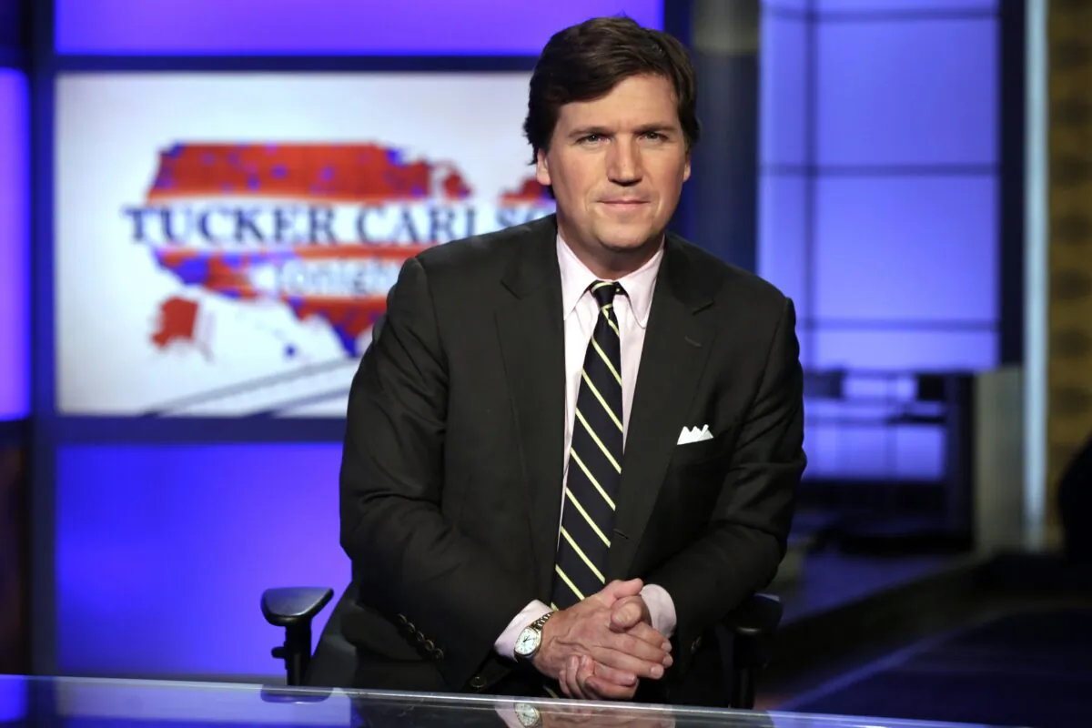 Tucker Carlson, host of "Tucker Carlson Tonight," poses for photos in a Fox News Channel studio in New York on March 2, 2017. (Richard Drew/AP Photo)