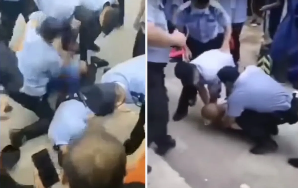 Villagers and police fight with each other in Xihongmen town in Beijing, China, on July 13, 2020. (video screenshot)