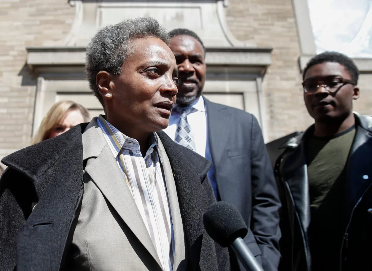 Chicago Mayor-elect Lori Lightfoot leaves the Rainbow PUSH Coalition after a unity press conference with mayoral candidate Toni Preckwinkle in Chicago, Ill., on April 3, 2019. (Kamil Krzaczynski/AFP via Getty Images)