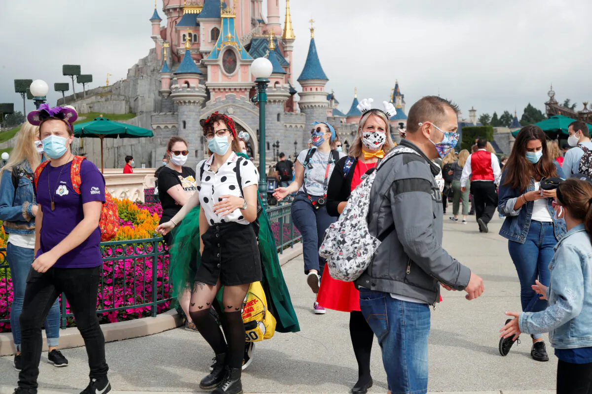 First visitors arrive at Disneyland Paris as the theme park reopens its doors to the public in Marne-la-Vallee, near Paris, following the coronavirus disease (COVID-19) outbreak in France, July 15, 2020. (Charles Platiau/Reuters)