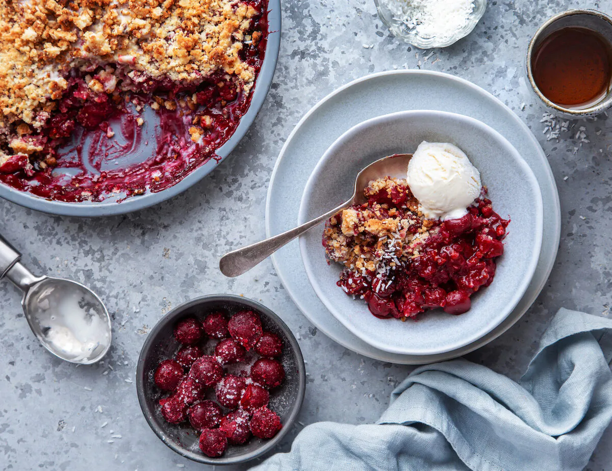 A delicious cherry crisp—or is it a crumble? Debate the matter over a warm, freshly baked piece, served with ice cream. (Anna Shepulova/Shutterstock)