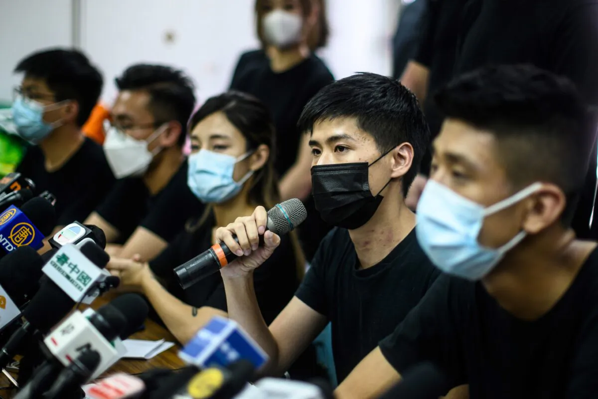 Pro-democracy activist Lester Shum (2nd R) and other winners of the unofficial democratic primaries hold a press conference in Hong Kong on July 15, 2020. (Anthony Wallace/AFP via Getty Images)