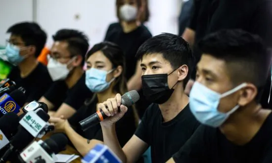 Unofficial Hong Kong Vote Sees New Generation Take Over Battle for Democracy