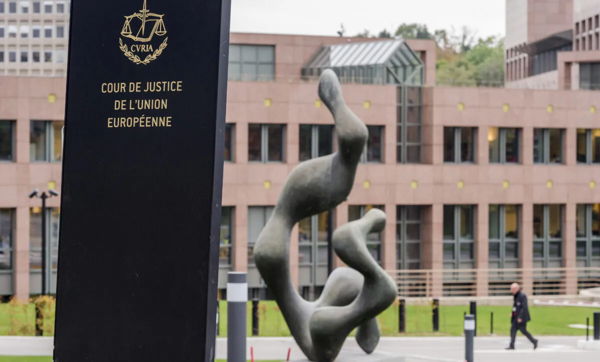 A man walks by the European Court of Justice in Luxembourg on Oct. 5, 2015. The European Union’s top court ruled that an agreement that allows big tech companies to transfer data to the United States is invalid, and that national regulators need to take tougher action to protect the privacy of users' data. July 16, 2020. (Geert Vanden Wijngaert/AP Photo)