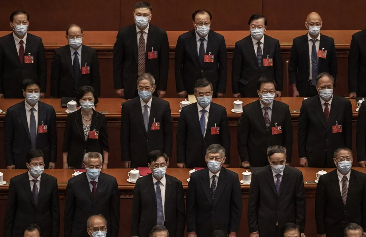 Chinese Communist Party delegates attend the regime’s rubber stamp legislative conference in Beijing, China, on May 28, 2020. (Kevin Frayer/Getty Images)
