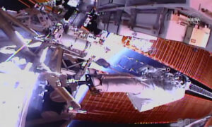 Spacewalking Astronauts Closing in on Final Battery Swaps